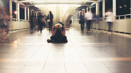 A young man overwhelmed with political fatigue and the question of whether to stay or leave