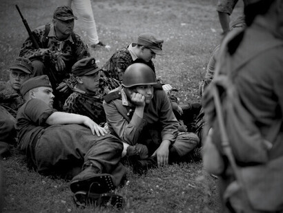 Soldiers standing together during the world war era, illustrating how entire generations were redirected by conflict