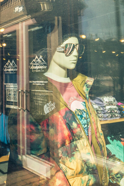 Fashionable mannequin in a Paris storefront display, Île-de-France