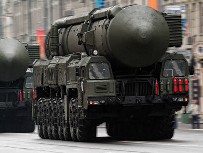 Russian forces stationed next to the Yars intercontinental ballistic missile system, a key component of the country’s nuclear arsenal