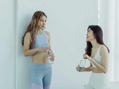 A warm exchange between friends, symbolising the type of companionship that helps people live happily