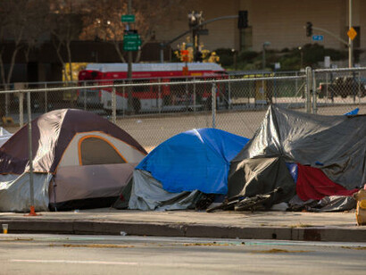 A homeless encampment in the United States, exposing the depth of urban poverty