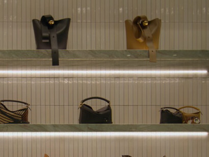 Loewe’s New Sydney Flagship Store, Australia, where minimalist interiors transform handbags into museum-worthy artifacts ©thecommercialproject