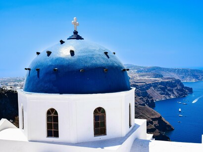 A serene blue-domed church, symbolising clarity and purity that Christians aspire to have