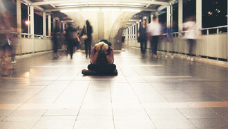 A young man overwhelmed with political fatigue and the question of whether to stay or leave