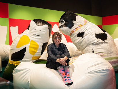 Portrait of Pippa Hale at the exhibition. Courtesy of the Bowes Museum ©The Bowes Museum, County Durham. Photography by Claire Collinson