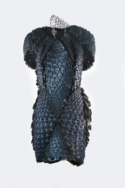 The Pangolin Dress, created in collaboration with Travis Fitch and Stratasys, showcases innovative 3D printing technology