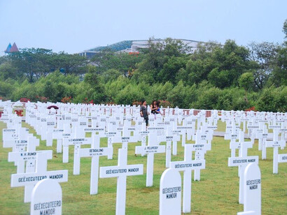 The historic burial grounds of Ereveld Ancol cemetery in Jakarta, illustrating how accountability was buried alongside its victims