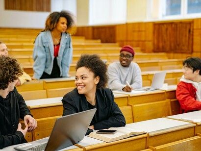 An inclusive classroom environment with students from various backgrounds working together
