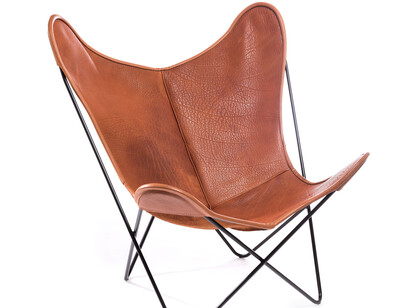 Silla B.K.F.,(Bonet, Kurchan y Ferrari) conocida como silla mariposa. Diseñada entre 1938 y 1940, estructura de acero y asiento de cuero de una sola pieza(Búfalo).