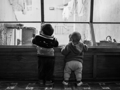 Time pauses, allowing innocence and imagination to exist without urgency