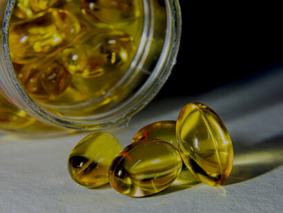 softgel vitamin capsules, emphasizing health and wellness supplements