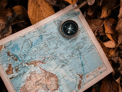 Tools of exploration, laid against nature’s floor, symbolize humanity’s eternal hunt for what’s been intentionally concealed