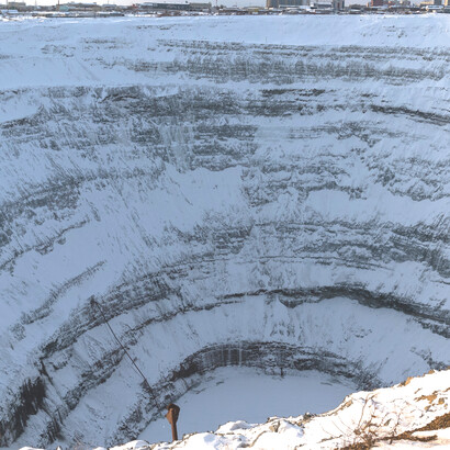 The Mir mine, also known as the Mirny mine, is a massive open-pit diamond mine located in Mirny, in the Sakha Republic of eastern Siberia, Russia. Measuring over 525 meters deep and 1,200 meters wide, it stands as one of the largest man-made excavations in the world