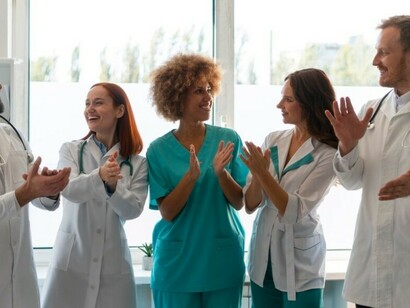 Healthcare professionals from around the world join forces, reflecting the importance of cultural diversity and teamwork in delivering compassionate, inclusive care