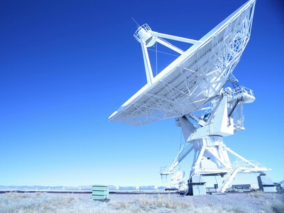 A dish receiving signals, highlighting the integration of technology and strategy in space governance