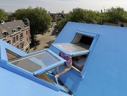 Didden Village in Rotterdam, Netherlands, reimagines rooftop architecture by turning unused space into a private family micro-village