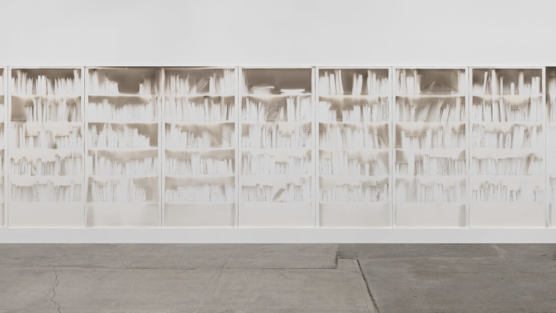 Delocazione 2024, smoke and soot on board 150 x 600 cms. The architecture of knowledge rendered in absence. Claudio Parmiggiani's "Delocazione" is a profound exploration of space, memory, and the silent narratives held within empty forms. Image courtesy of the Artist/Estorick Collection of Modern Italian Art