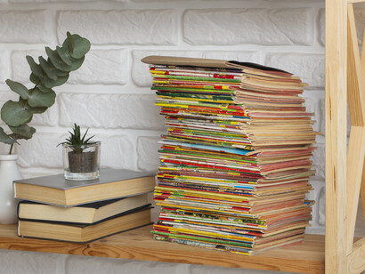 A shelf lined with manga, reflecting the growing appetite for darker, more emotionally charged Shōnen worlds