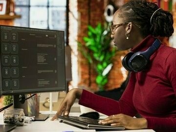 A woman working in the tech industry, representing how the number of female workers has gone up and how it serves as an inspiration for young girls interested in STEM