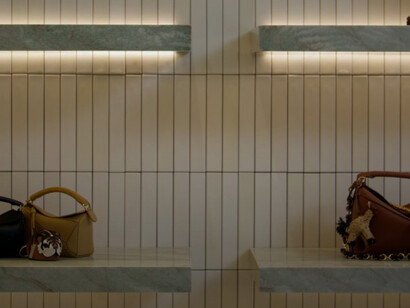 Loewe’s New Sydney Flagship Store, Australia, featuring stone plinths and steel columns that echo gallery architecture ©thecommercialproject