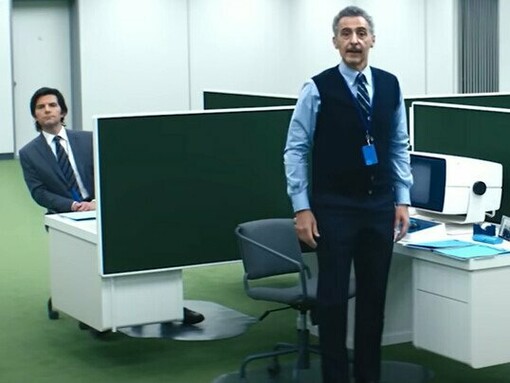 The green carpet, vintage monitors, and robotic gazes scream Lumon—this is the heart of Severance's psychological maze