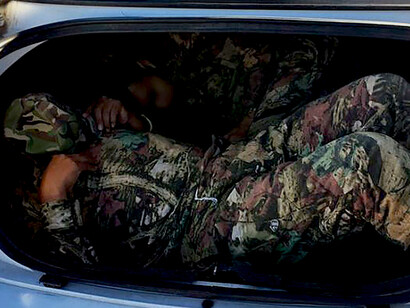 The arrest of a U.S. citizen at the Interstate 19 checkpoint near Amado, following the discovery of two Mexican nationals hidden in a vehicle trunk, highlights the role of cross-border human smuggling in undermining state authority and exploiting legal gaps in border enforcement