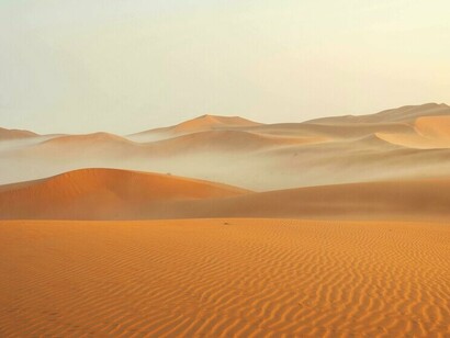 A quiet desert at dusk, mirroring Morocco’s calm steadiness even as the Sahara dispute persists