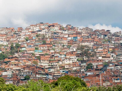 Petare’s hillside maze reflects the daily struggle of a city caught between resilience and neglect