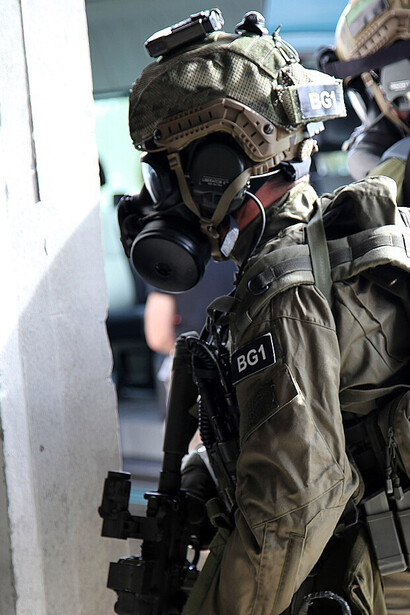 Soldiers in the Polish Multi-role exploitation Reconnaissance Team (MRT) conduct a security check of the a building suspected of having hazardous material in Lisbon, Portugal on October 29, 2015 during NATO exercise Trident Juncture 15