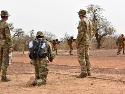 U.S. Special Forces Soldiers observe Burkina Faso Soldiers during a react to contact practical exercise March 1, 2017 at Camp Zagre, Burkina Faso