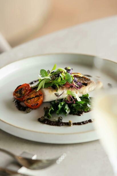 Gourmet Paleo-style fish and vegetable dish elegantly plated in Tokyo, Japan