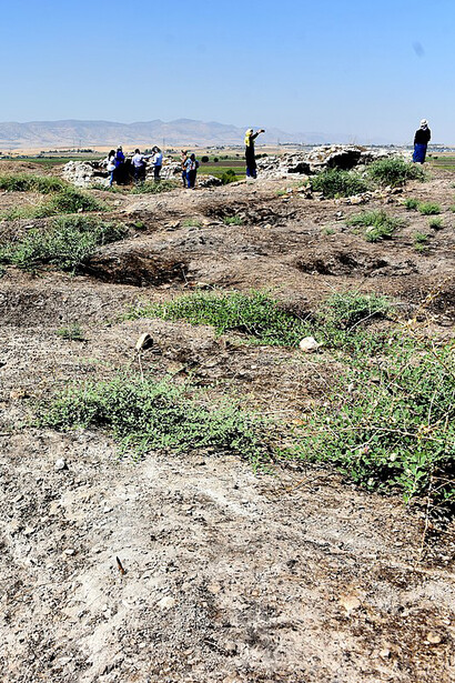 Yasin Tepe archaeological site featuring looters' pits, Sulaymaniyah Governorate, Iraqi Kurdistan