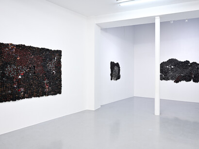 Eva Obodo, And we hired a carpenter to patch the cloth, exhibition view. Courtesy of Afikaris Gallery and the artist