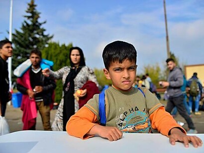 Families and small children among the refugees on their journey