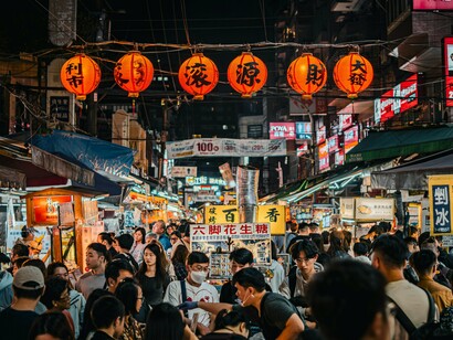 In the press of strangers and symbols, cognition stretches beyond its familiar borders