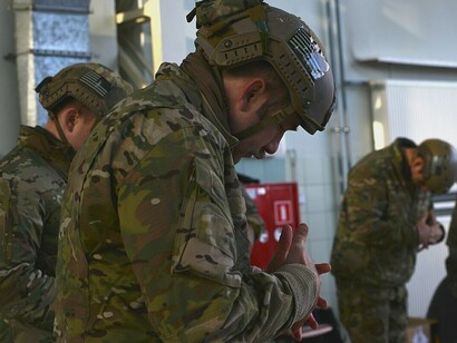 A U.S. Special Forces soldier assigned to the U.S. Army 19th Special Forces Group (Airborne), rehearses emergency procedures during sustained airborne training for combined airborne operation with the Polish Forces, Dec. 3, 2019, near Krakow, Poland