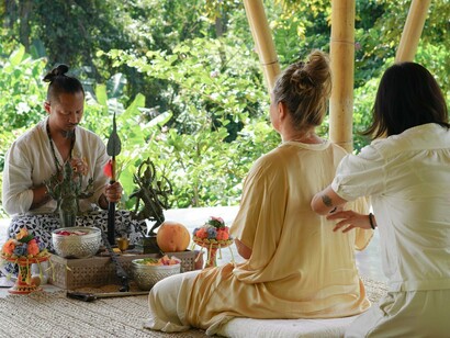 A healing ritual unfolds in the jungle pavilion, where ancient wisdom meets modern spiritual practice © Photo by Goddess Retreats