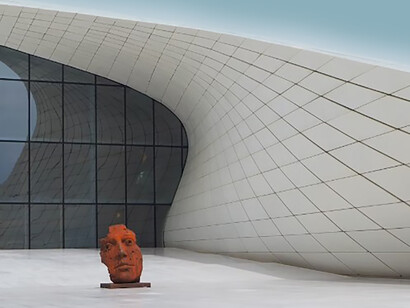 The Heydar Aliyev Center (Azerbaijani: Heydər Əliyev Mərkəzi) is a 57,500 m2 (619,000 sq ft) building complex in Baku, Azerbaijan, designed by Zaha Hadid