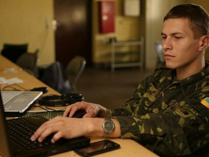 Ukraine Army First Lieutenant Vitalii Dudnyk monitors the Ukrainian mission group’s cyber network to detect and mitigate virtual attacks during Exercise Combined Endeavor 14 in Grafenwöhr, Germany, on September 9. Combined Endeavor is the world’s largest command, control, communications, and computer (C4) systems exercise, bringing together more than 1,200 communications professionals from 31 NATO and Partnership for Peace countries, along with European security partners