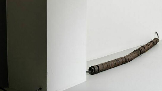 A Conductor (Montmartre)”, 2012., Section of 1920s electrical power distribution cable. Copper, paper soaked in oil, 210 cm, ø 10,5 cm.