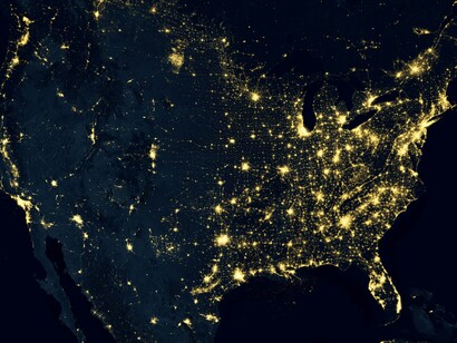 Night lights trace global connectivity, revealing economic intensity rather than human wellbeing