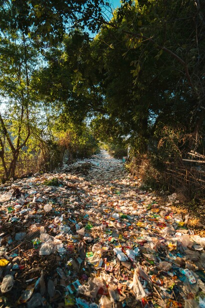 In Myanmar, plastic waste lines the riverbanks and clings to the trees