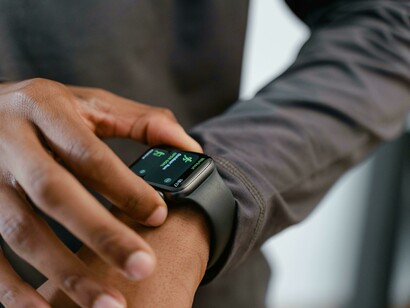 Close-up shot of a person interacting with a smartwatch