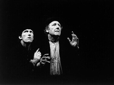 Waiting for Godot is a landmark play by Samuel Beckett, in which two characters, Vladimir (Didi) and Estragon (Gogo), spend their time in endless conversation and interaction, waiting for the absent Godot, who never materializes