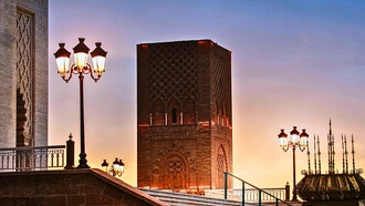 The Hassan Tower captured in sunset hues, symbolizing Morocco’s timeless architectural legacy