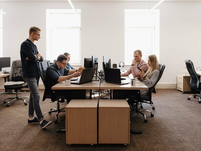 A focused team at work, where cybersecurity awareness and training are now vital in defending against rising email-based threats