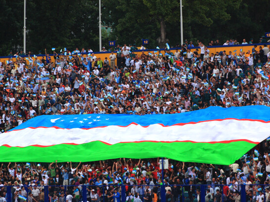 Supporters of the Uzbekistan national football team during a 2010 FIFA World Cup Asian qualification match against Japan at Pakhtakor Stadium in Tashkent