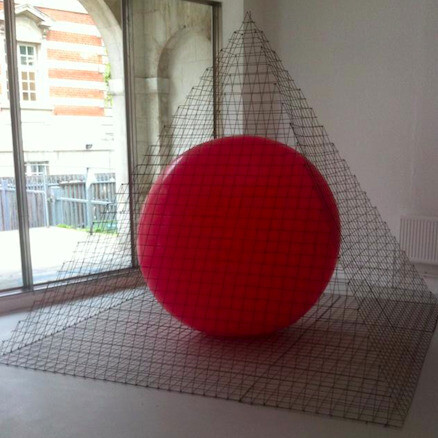 Natascha Young, Steel Pyramid Red Balloon, 2014, Steel and Rubber, 6 x 6 x 6 FT