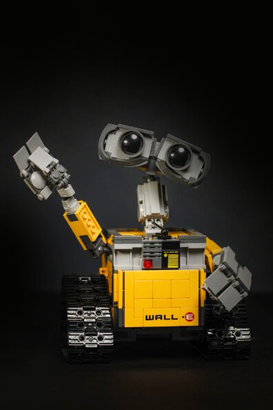 With its mechanical form and muted colors, the yellow and gray robot toy captures how technology can mirror — but never fully hold — the weight of human sorrow.
